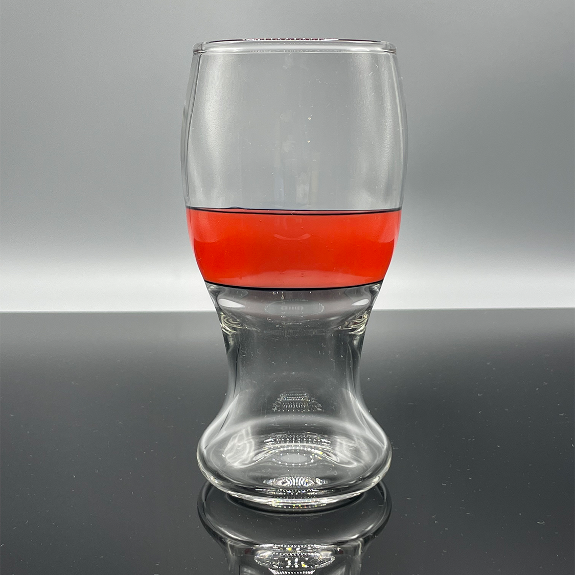 16 ounce beer glass with orange accents.