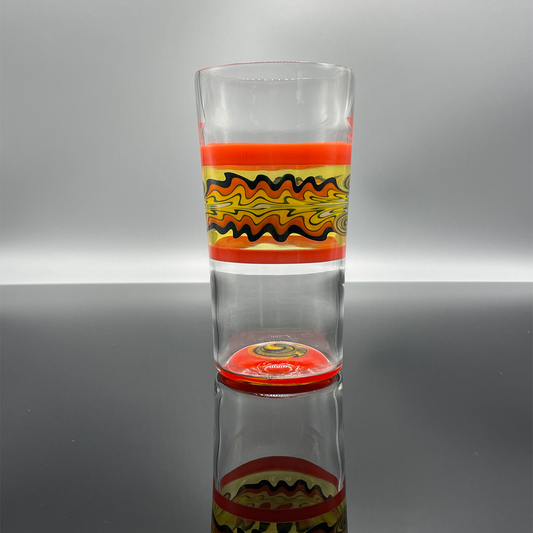 Fire themed beer glass with multiple sections of colored borosilicate glass.